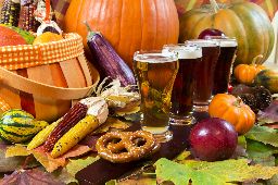 Oktoberfest beer flight of four samples with fall seasonal decoration