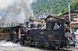 Nostalgic steam locomotive at Lauterbrunnen railway station in Jungfrau region of Switzwland