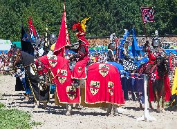 Men in knight armor during tournament reconstruction near Kyburg castle in Agasul, Canton Zurich, Switzerland.