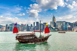Traditional Chinese wooden sailing ship in Victoria Harbour, Hong Kong