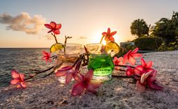 Drinks at sunset overlooking the Caribbean Ocean, Curacao island