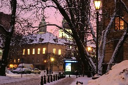 Illuminated buildings of the Warsow old tow in winter, Poland