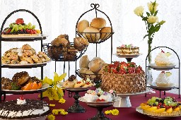Beautiful display of cakes, muffins, pastry, breads, cookies, pies and fruit tortes