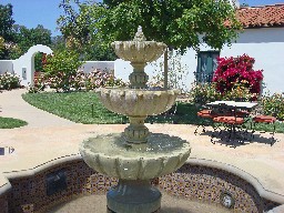 Upscale inn and spa in Southern California, with fountain and arched entry